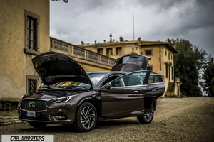 Infiniti Q30 – front three-quarter, brown on a gravel path