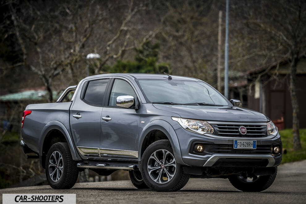 Fiat Professional Fullback – front three-quarter, grey metallic on a country road