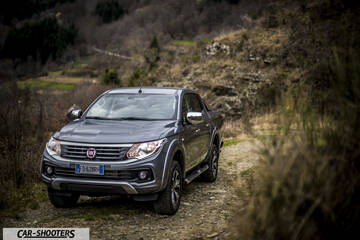 Fiat Professional Fullback – front three-quarter, grey metallic on a country road