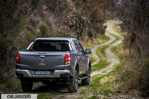 Fiat Professional Fullback – rear three-quarter, grey metallic on a country road