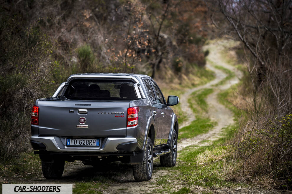 Fiat Professional Fullback – rear three-quarter, grey metallic on a country road