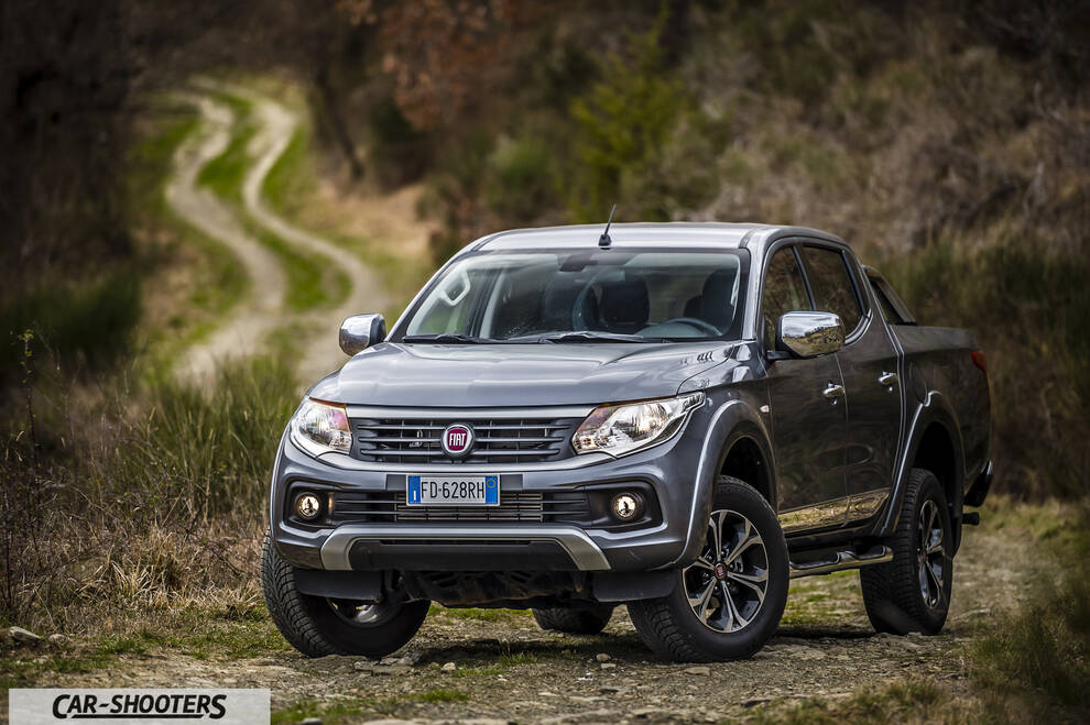 Fiat Professional Fullback – front three-quarter, grey metallic on a country road