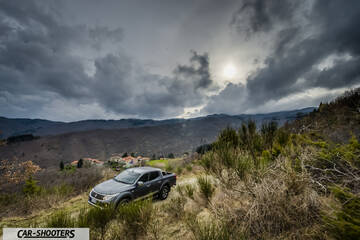Fiat Professional Fullback – front three-quarter, grey against a mountain backdrop