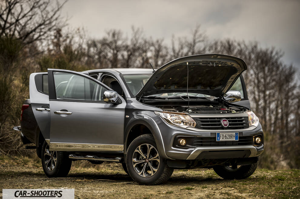 Fiat Professional Fullback – front three-quarter, grey metallic against a mountain backdrop