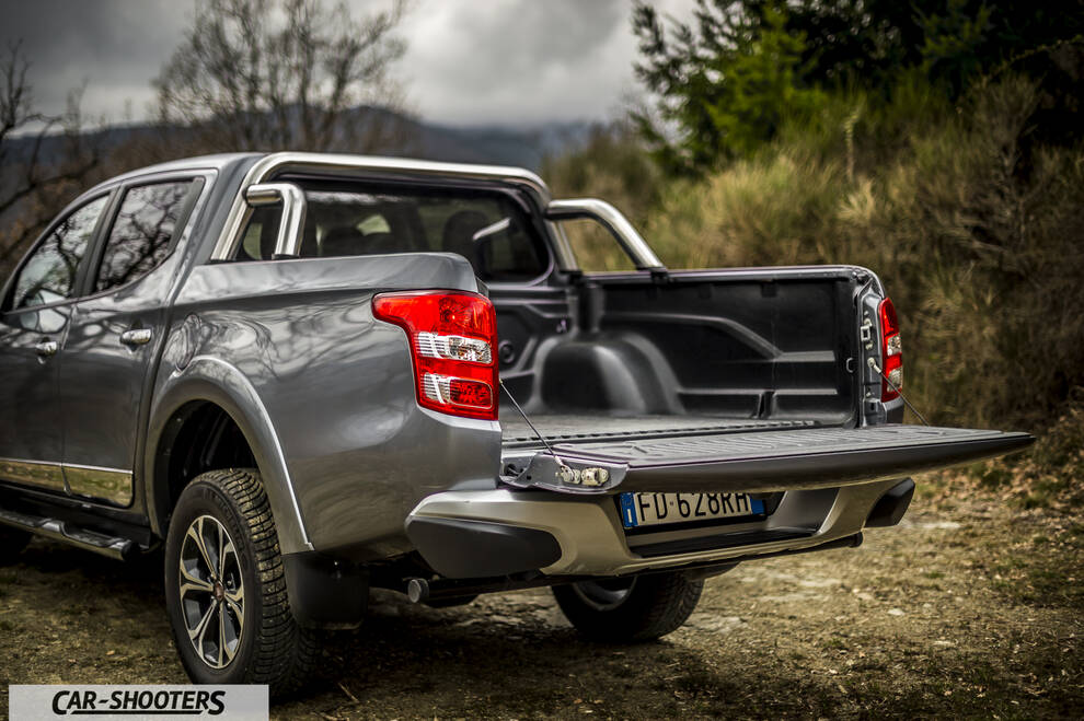 Fiat Professional Fullback – rear three-quarter, grey metallic on a dirt road