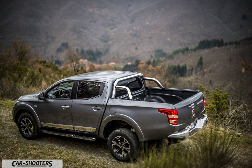 Fiat Professional Fullback – rear three-quarter, grey metallic against a mountain backdrop