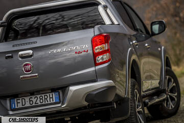 Fiat Professional Fullback – rear three-quarter, grey metallic on a dirt road