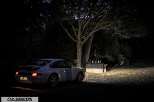 Porsche 993 Carrera 4 – rear three-quarter, white at night under a tree