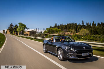 Fiat 124 Spider – front three-quarter, dark grey on a country road