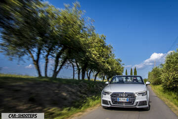 Audi A3 Cabriolet – front three-quarter, silver driving on a country road