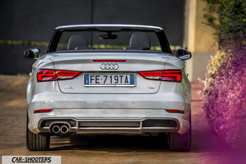 Audi A3 Cabriolet – rear view, silver on a paved driveway