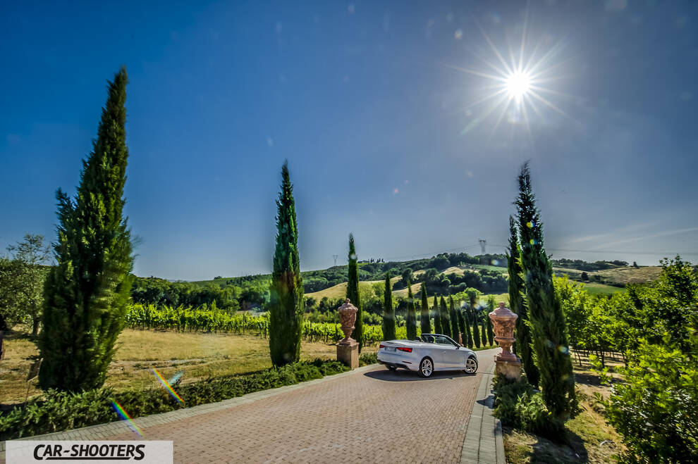 Audi A3 Cabriolet – rear three-quarter, white on a sunny driveway