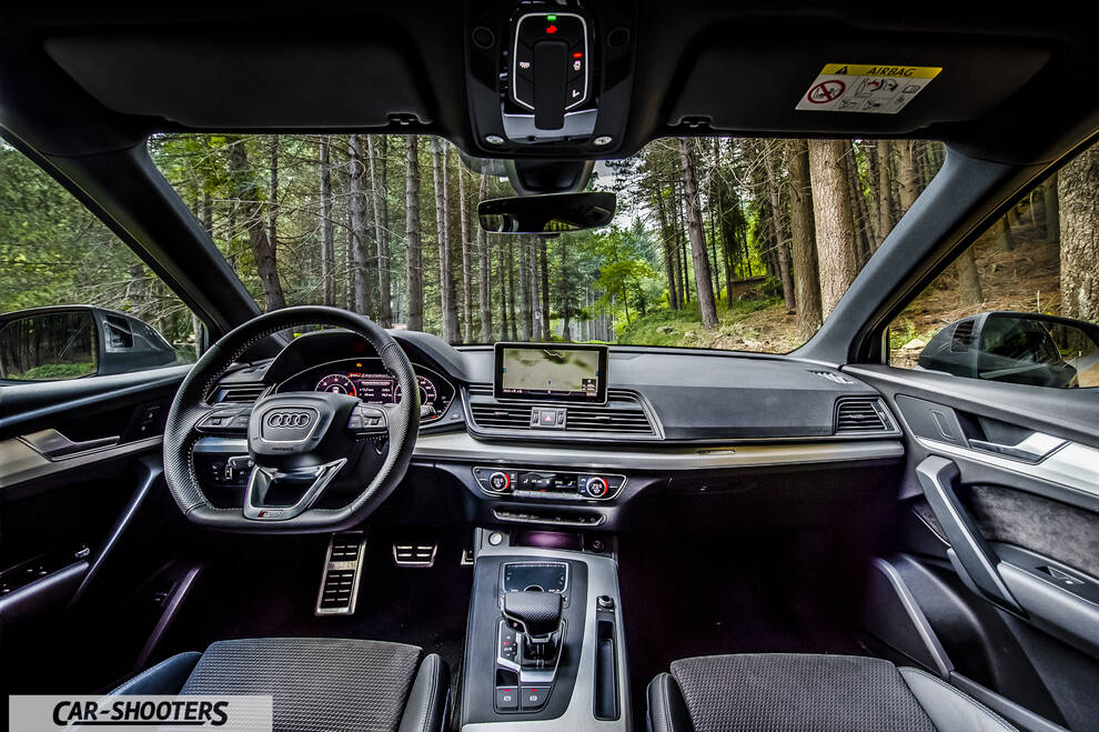 Audi Q5 – dashboard, with forest view through windshield