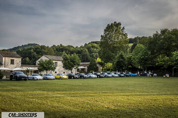 front three-quarter, parked on a grassy lawn