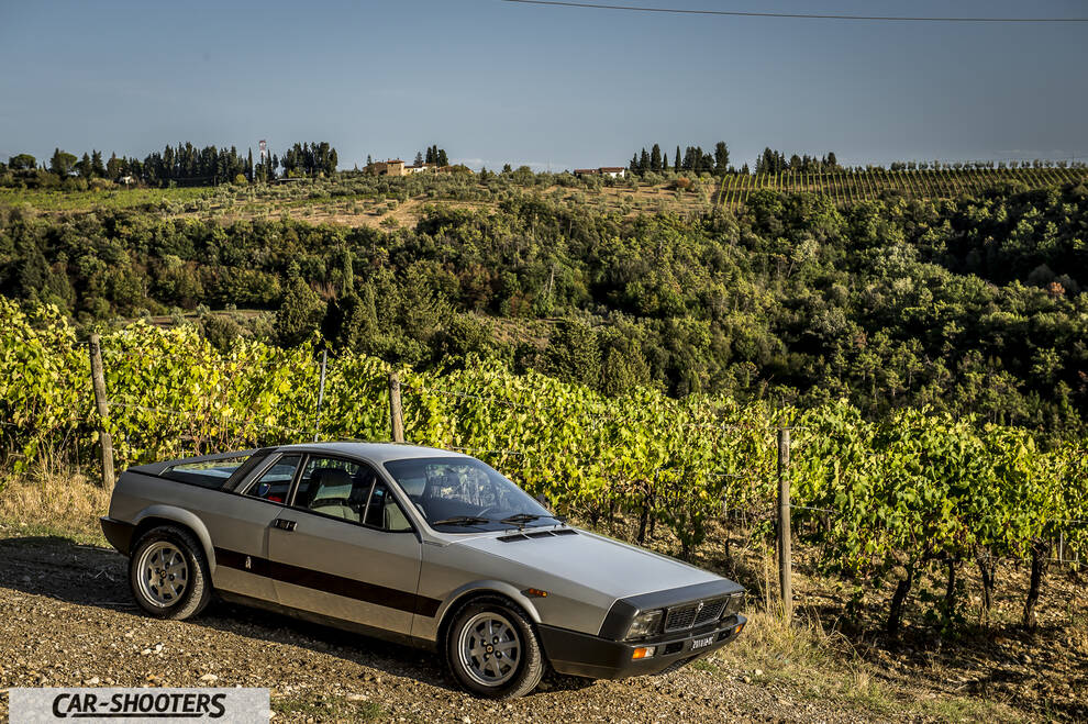 Lancia Beta Montecarlo – front three-quarter, silver against a vineyard landscape