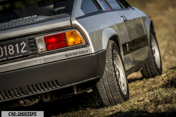 Lancia Beta Montecarlo – rear three-quarter, silver parked on dirt ground