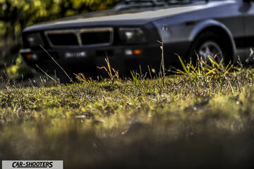 Lancia Beta Montecarlo – front three-quarter, silver parked on grass
