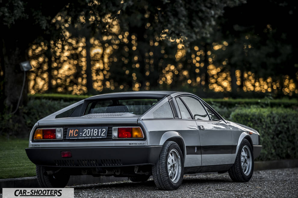 Lancia Beta Montecarlo – rear three-quarter, silver parked on gravel
