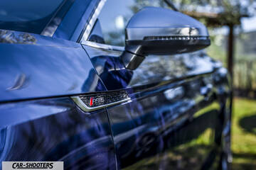 Audi – detail, side mirror and fender badge close-up