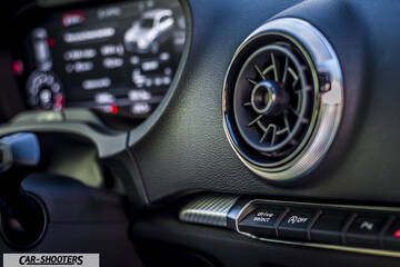 Audi – dashboard, round air vent and digital instrument cluster