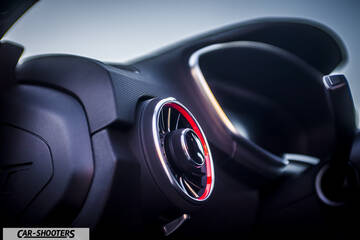 Audi – dashboard, air vent with red accent
