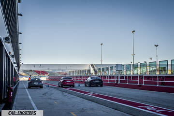 Audi – rear view, at a racetrack pit lane