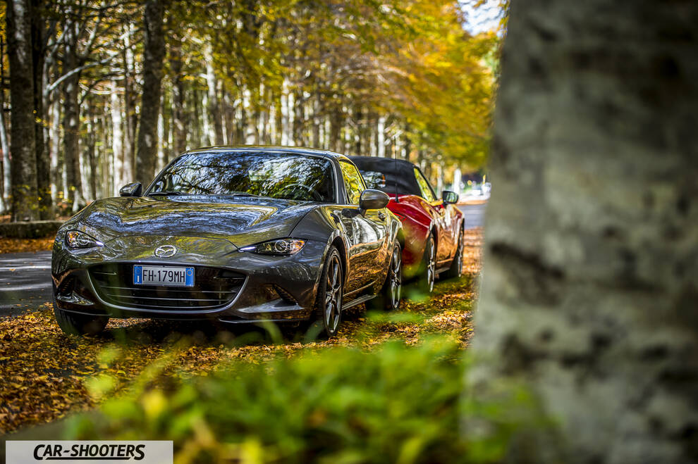 Mazda MX 5 ND – front three-quarter, grey metallic on a forest road
