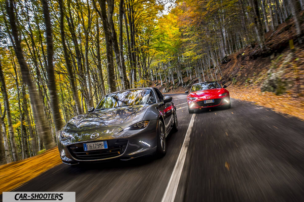 Mazda MX 5 ND – front three-quarter, grey metallic on a winding autumn road
