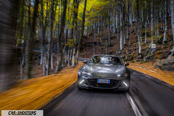 Mazda MX 5 ND – front three-quarter, grey metallic on a country road