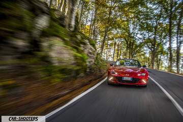 Mazda MX 5 ND – front three-quarter, red on a country road