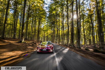 Mazda MX 5 ND – front three-quarter, red on a country road