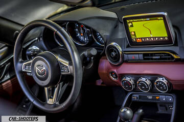Mazda MX 5 ND – dashboard, with red dash trim and navigation screen