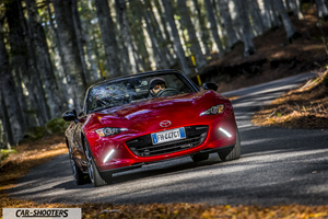 Mazda MX 5 ND – front three-quarter, red on a country road