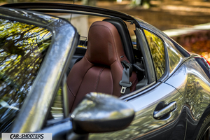 Mazda MX 5 ND – detail, brown leather seat visible through open roof
