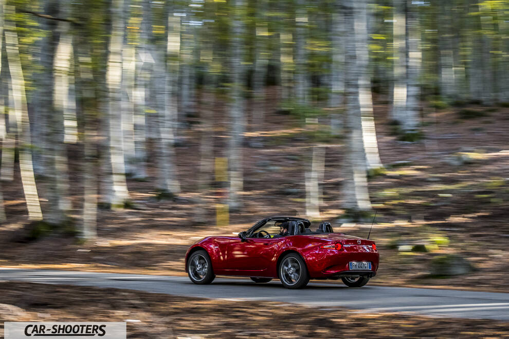 Mazda MX 5 ND – rear three-quarter, red on a country road