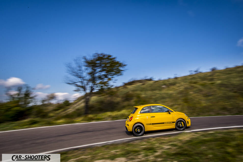 Abarth 595 Competizione – rear three-quarter, yellow on a country road