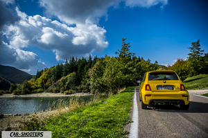 Abarth 595 Competizione – rear view, yellow on a country road