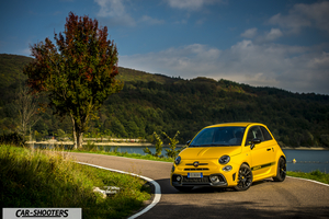 Abarth 595 Competizione – front three-quarter, yellow on a country road