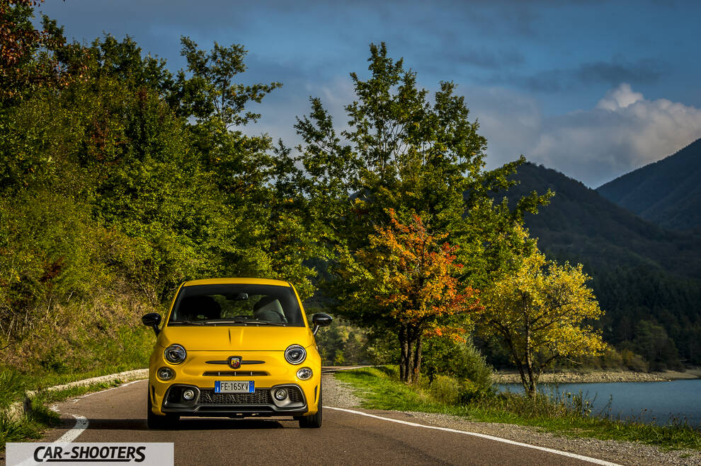 Abarth 595 Competizione – front three-quarter, yellow on a country road