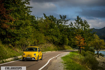 Abarth 595 Competizione – front three-quarter, yellow on a country road
