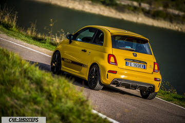 Abarth 595 Competizione – rear three-quarter, yellow on a country road
