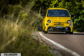 Abarth 595 Competizione – front three-quarter, yellow on a country road