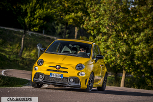 Abarth 595 Competizione – front three-quarter, yellow on a country road
