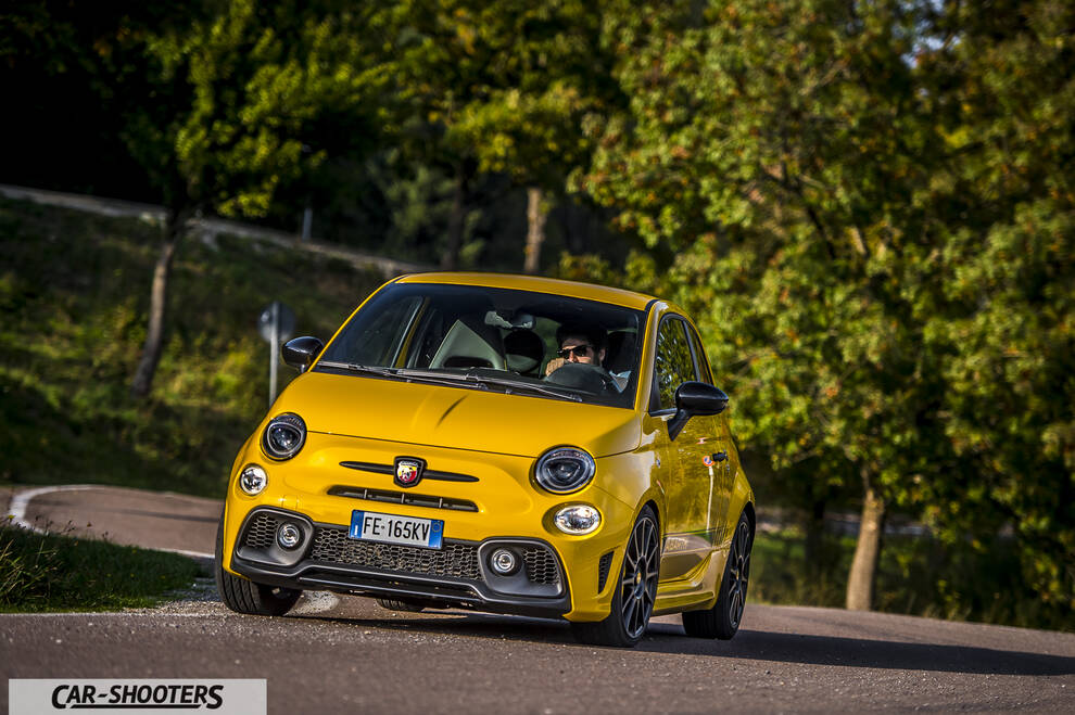 Abarth 595 Competizione – front three-quarter, yellow on a country road