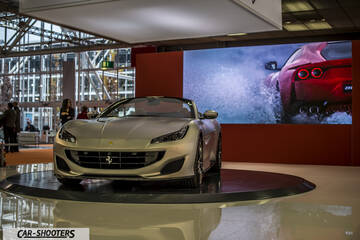 front three-quarter, silver on a display stage