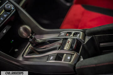 interior, manual gear shifter with red seats