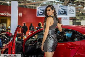 front three-quarter, red at a motor show