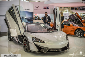 front three-quarter, silver at an auto show