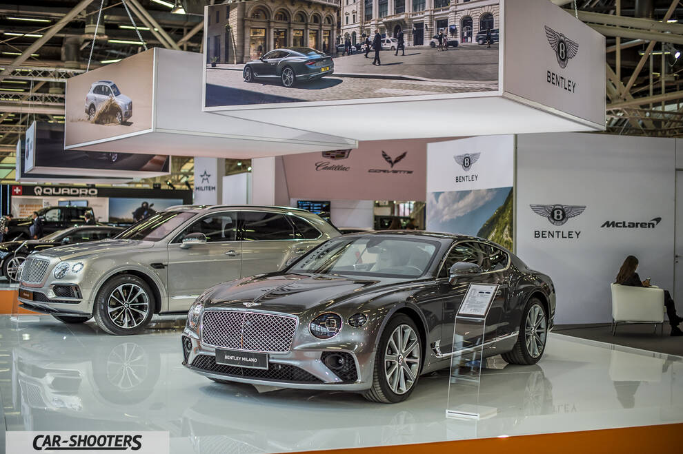 front three-quarter, grey metallic at a car exhibition