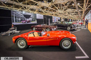 side profile, red in an exhibition hall